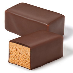Chocolate nougat candy on a white background
