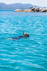 Snorkeling in sardinian emerald turquoise waters