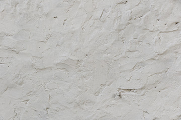 Fototapeta premium White rough concrete wall texture background. cement wall. plaster texture. blank for the designer