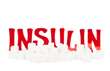 red cardboard insulin word surrounded by refined sugar cubes on white background, diabetes...