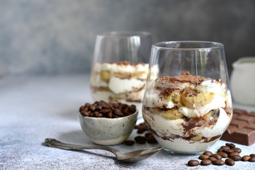 Tiramisu - traditional italian coffee dessert with biscuits and mascarpone cheese.
