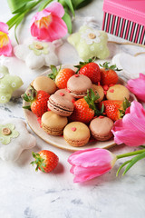 Sweets, strawberries and tulips