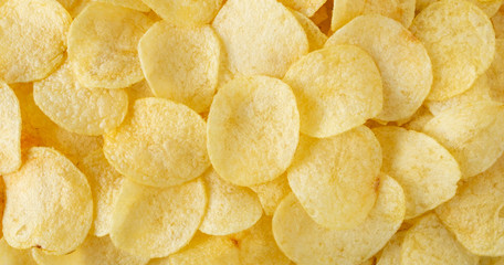 crispy potato chips snack texture background top view