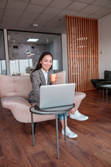 Asian woman is working in office