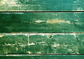 Green, processing Pinhole,background for photographing. Old painted dark boards. Textured wooden...