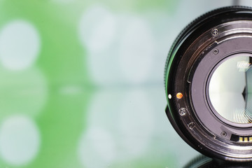 Equipment videographer and photographer. Lenses on the table against the background of bright...