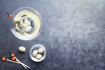 Travel concept. Tourist accessories gather in flight. Alcohol, camera, map and items.