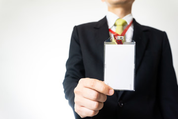 Man holding Identification card.