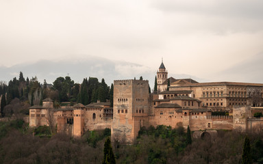Fototapeta na wymiar Alhambra in Granada on a Cloudy Sky