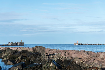 Fototapeta na wymiar Liepaja port south mole in calm day.