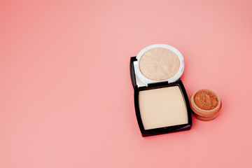 Tonal foundation and highlighter, base for make-up in the form of a cushion. Highlighter powder cosmetic product top view