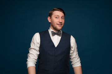 Positive young man in formal suit