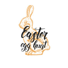 Hand made lettering -Easter egg hunt. Vintage hand drawn doodle chocolate bunny. Sketch. Spring. Vector engraving illustration. 