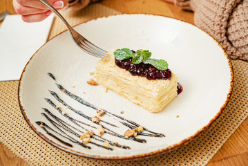 woman eating dessert in the cafe