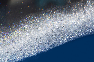 blue water with bubbles and blue drops background