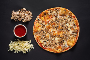 tasty pizza on the black background