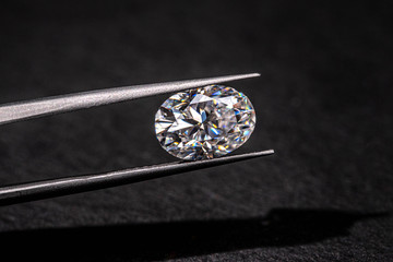 Diamond in Tweezers Close up