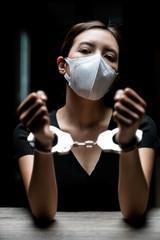 Handcuffed on a prisoner, Woman prisoners were handcuff in the dark prison.