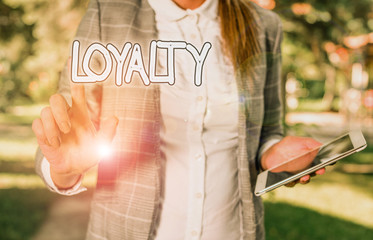 Conceptual hand writing showing Loyalty. Concept meaning faithfulness to commitments or obligations...