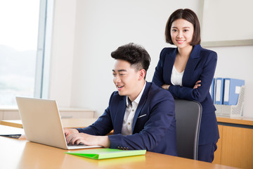 young boss and assistant at work