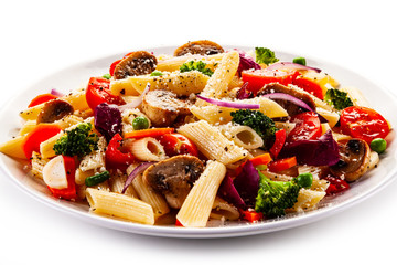 Penne with meat and vegetables on white background