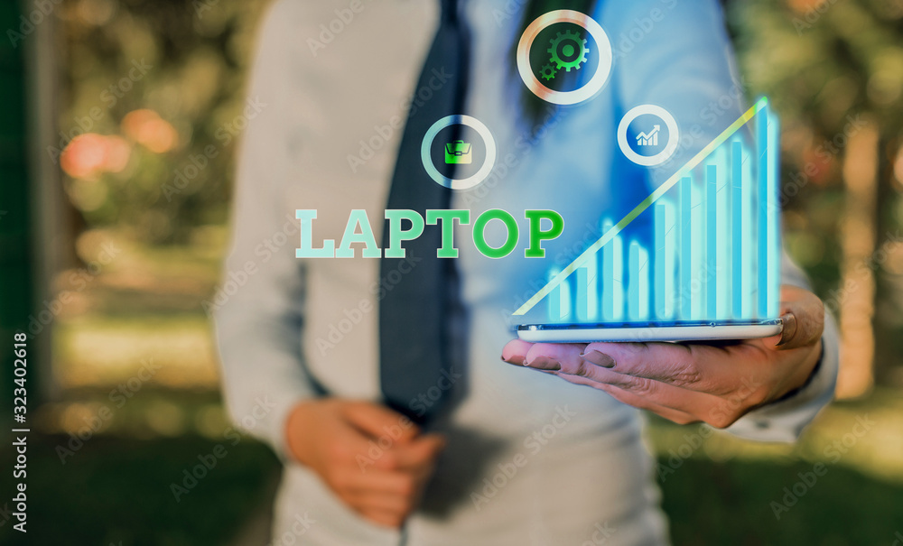 Aufkleber writing note showing laptop. business concept for computer that is portable and suitable for use whi