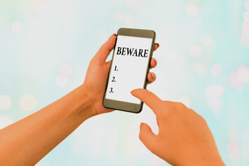 Conceptual hand writing showing Beware. Concept meaning used to warn someone to be very careful...
