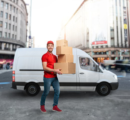 Courier ready to deliver packages with transport truck.