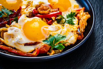 Shakshuka - fried eggs with vegetables