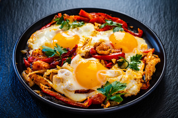 Shakshuka - fried eggs with vegetables