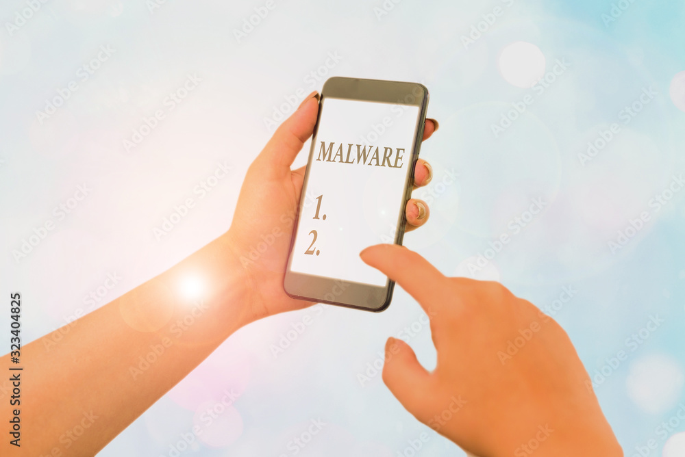 Poster handwriting text writing malware. conceptual photo malicious software or file that is harmful to a c