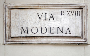 Via Modena street sign on wall in Rome