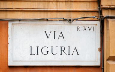Via Liguria sign on wall in Rome