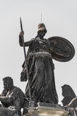 Old statue of a Roman woman with spire and shield at the central historical building Zitronenpresse...