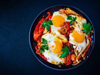 Shakshuka - fried eggs with vegetables
