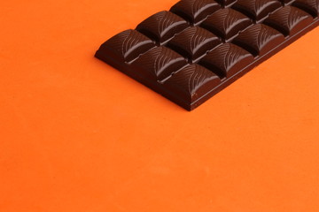 milk chocolate tablet in color background