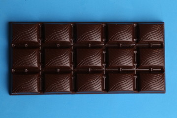 milk chocolate tablet in color background