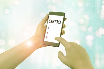Conceptual hand writing showing Cinema. Concept meaning theater where movies are shown for public...