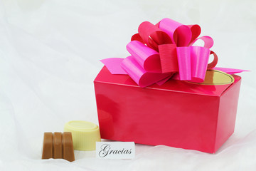 Gracias (thank you in Spanish) card with luxurious box of chocolates