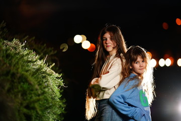 Two sisters of 13 and 8 years old