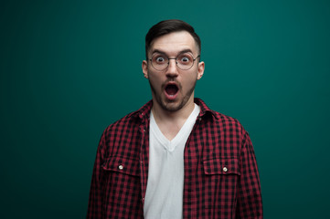 Portrait of a funny young interested man