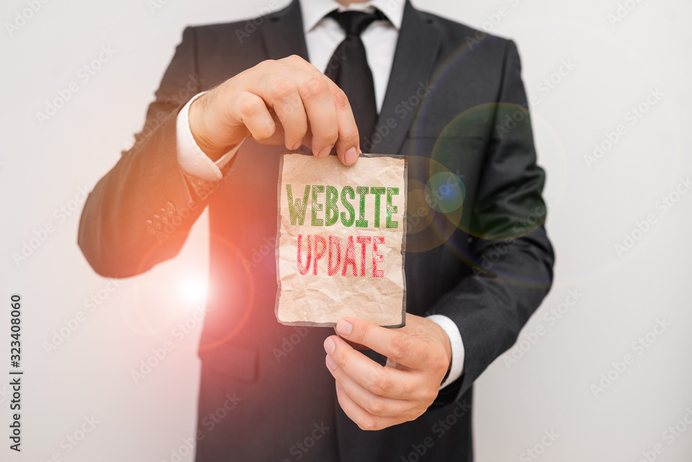Poster handwriting text website update. conceptual photo keeping the webpage and content up to date and tre