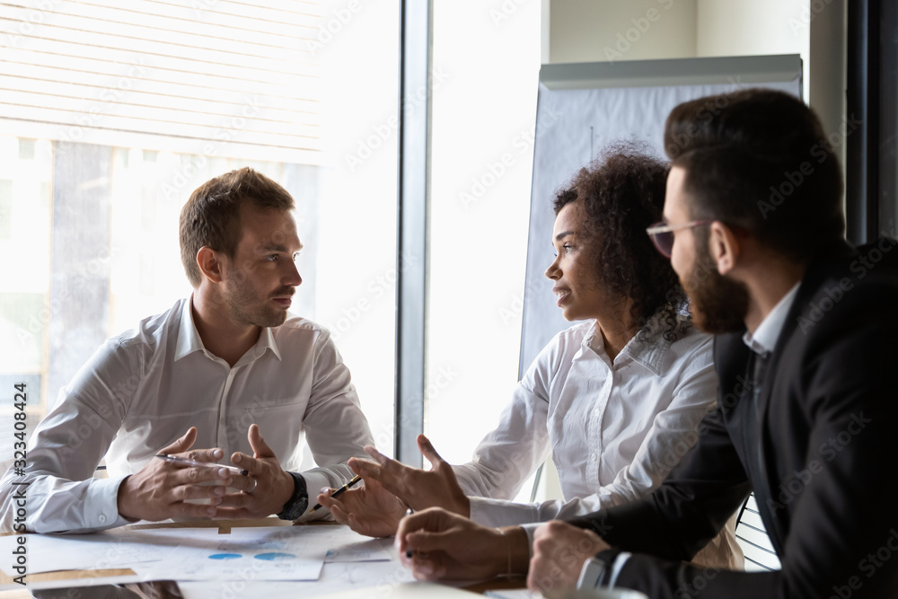 Sticker busy diverse employees listening african team leader at group meeting