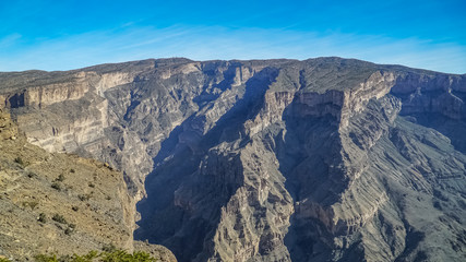 Fototapeta na wymiar Wadi Ghul aka Grand Canyon of Oman in Jebel Shams Mountains
