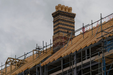 Scaffolding is erected whilst a new roof is installed