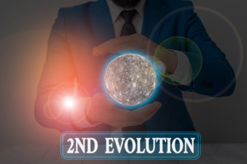 Handwriting text writing 2Nd Evolution. Conceptual photo change in the heritable features of...