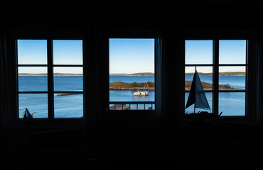 Fototapeta premium A view from window over a harbor. Perfect view. House of dream 