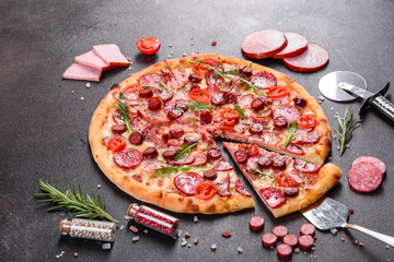 Pepperoni Pizza with Mozzarella cheese, salami and ham