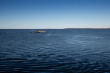 Sunset over the sea. Koster island. Marine protected area