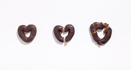 Heart shaped Chocolate cookies from love to break up on white